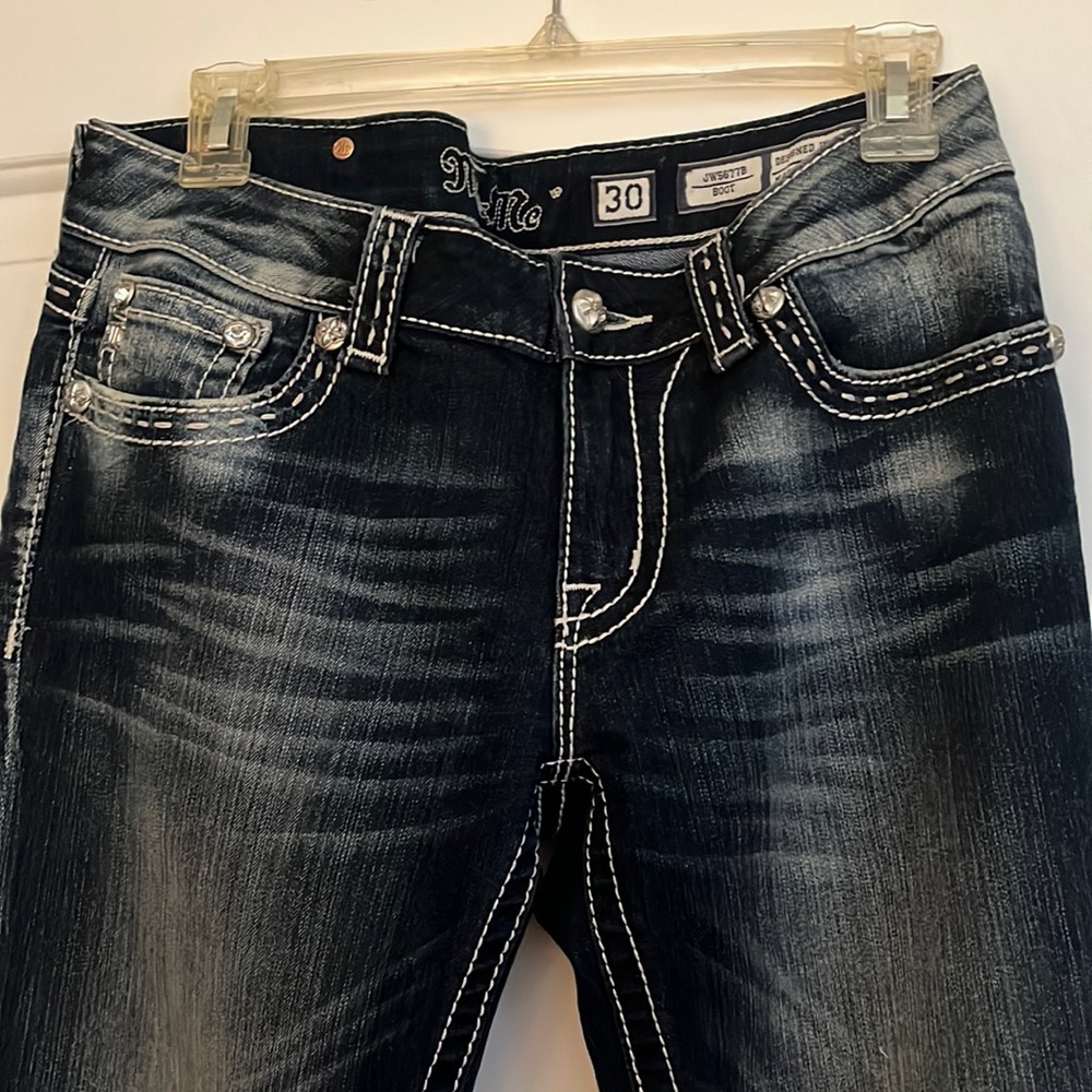 Miss Me traditional boot size 30-rise8” and inseam 30”. Perfect condition.